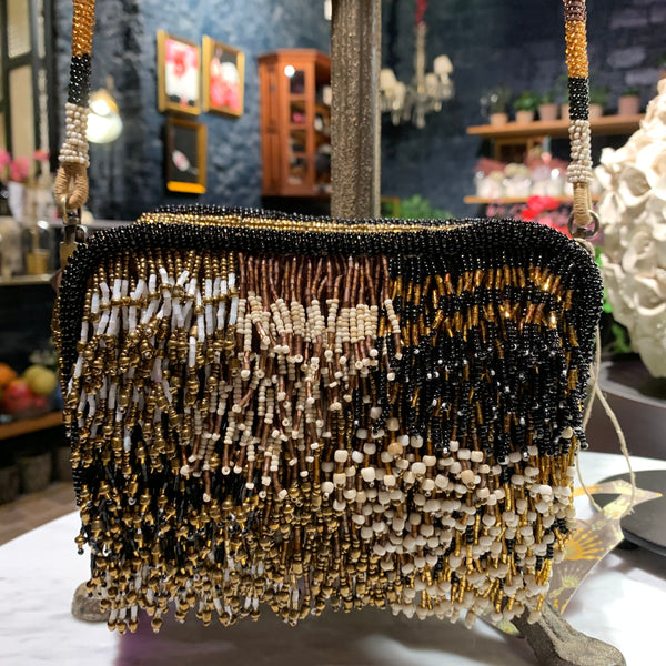 BOLSO NENUFAR FRINGES GOLD